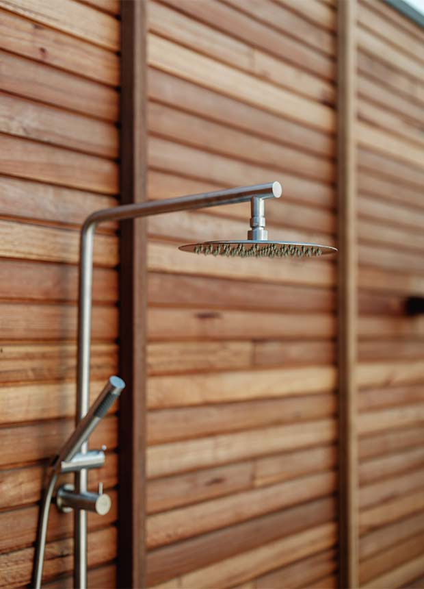 Outdoor shower in custom home in Torquay